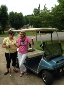 Suzanne and me with my golf cart