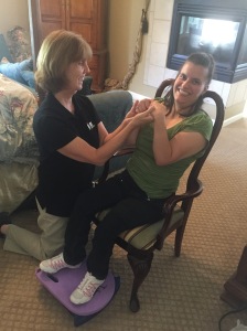 Trina doing physical therapy in a client's home