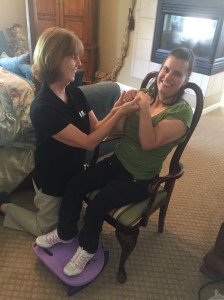 Trina doing physical therapy in a client's home